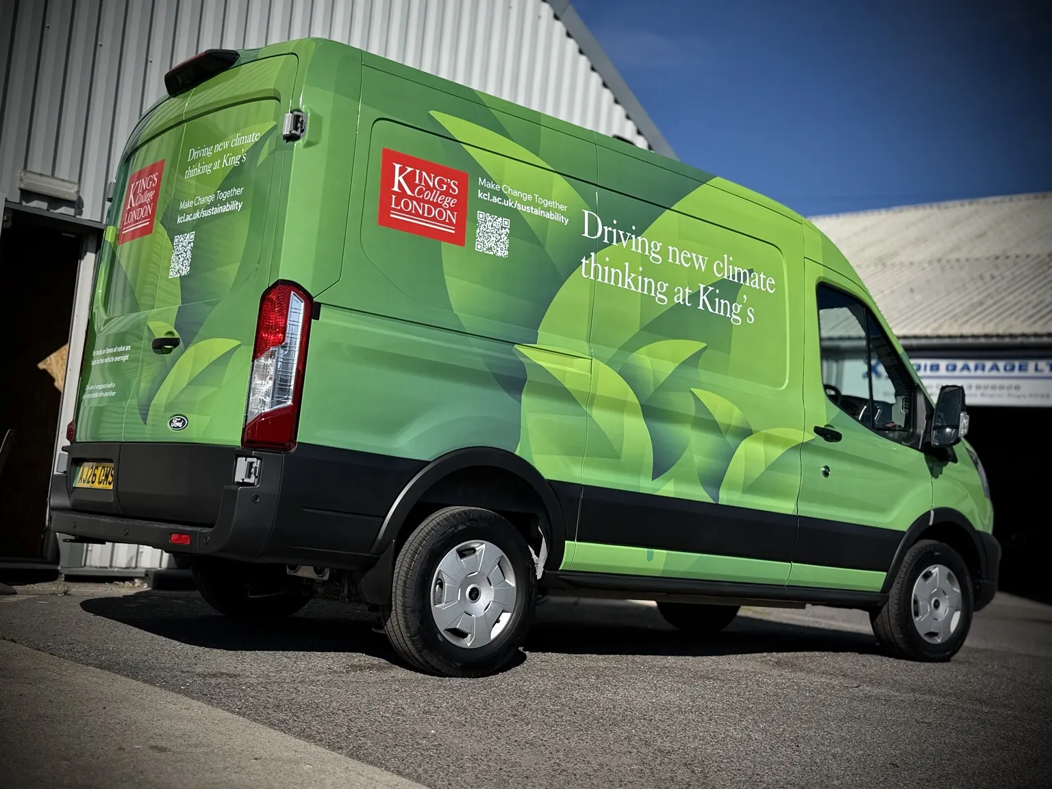 Rear three-quarter of the larger Transit with the adapted King's artwork