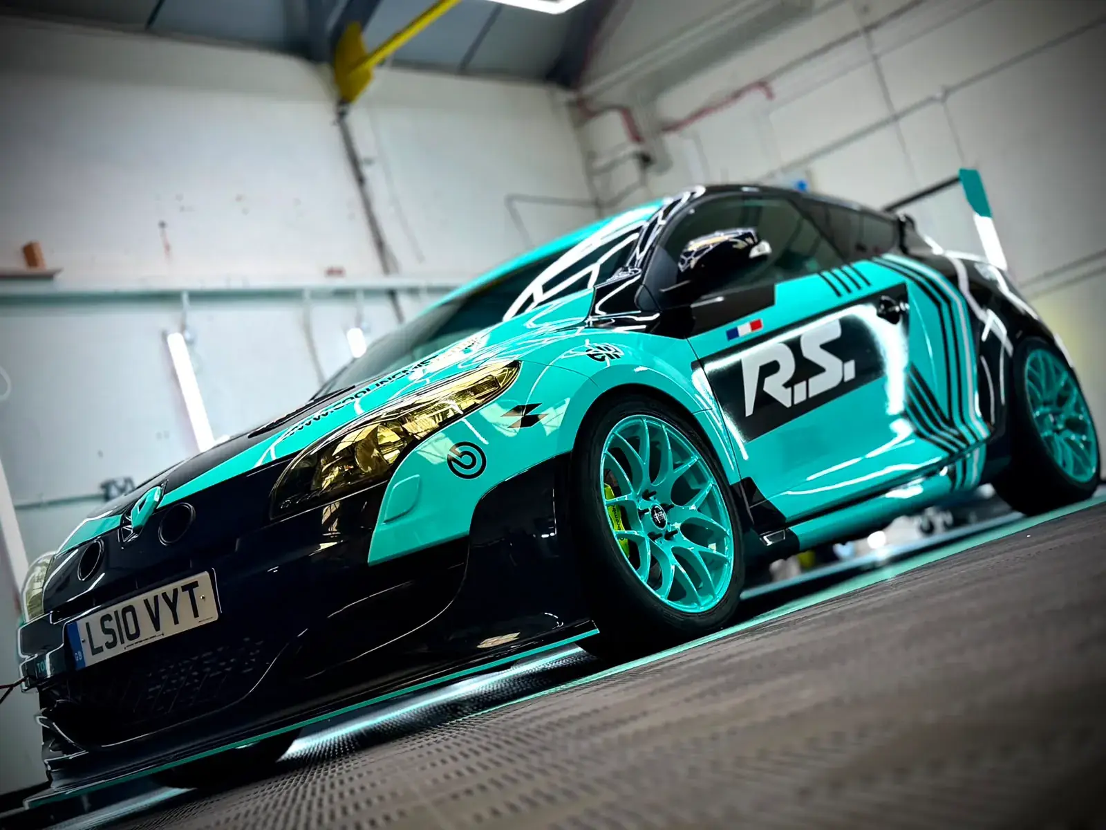 Renault Megane R.S. in its turquoise and black motorsport livery
