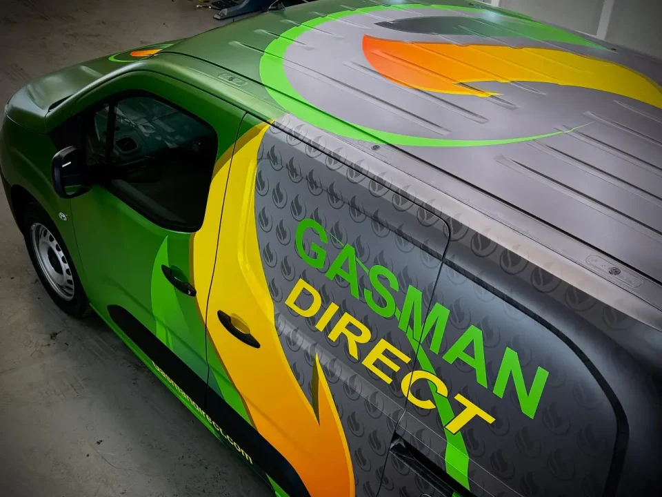 Angled view of a Gasman Direct commercial van wrap by P1 Wraps
