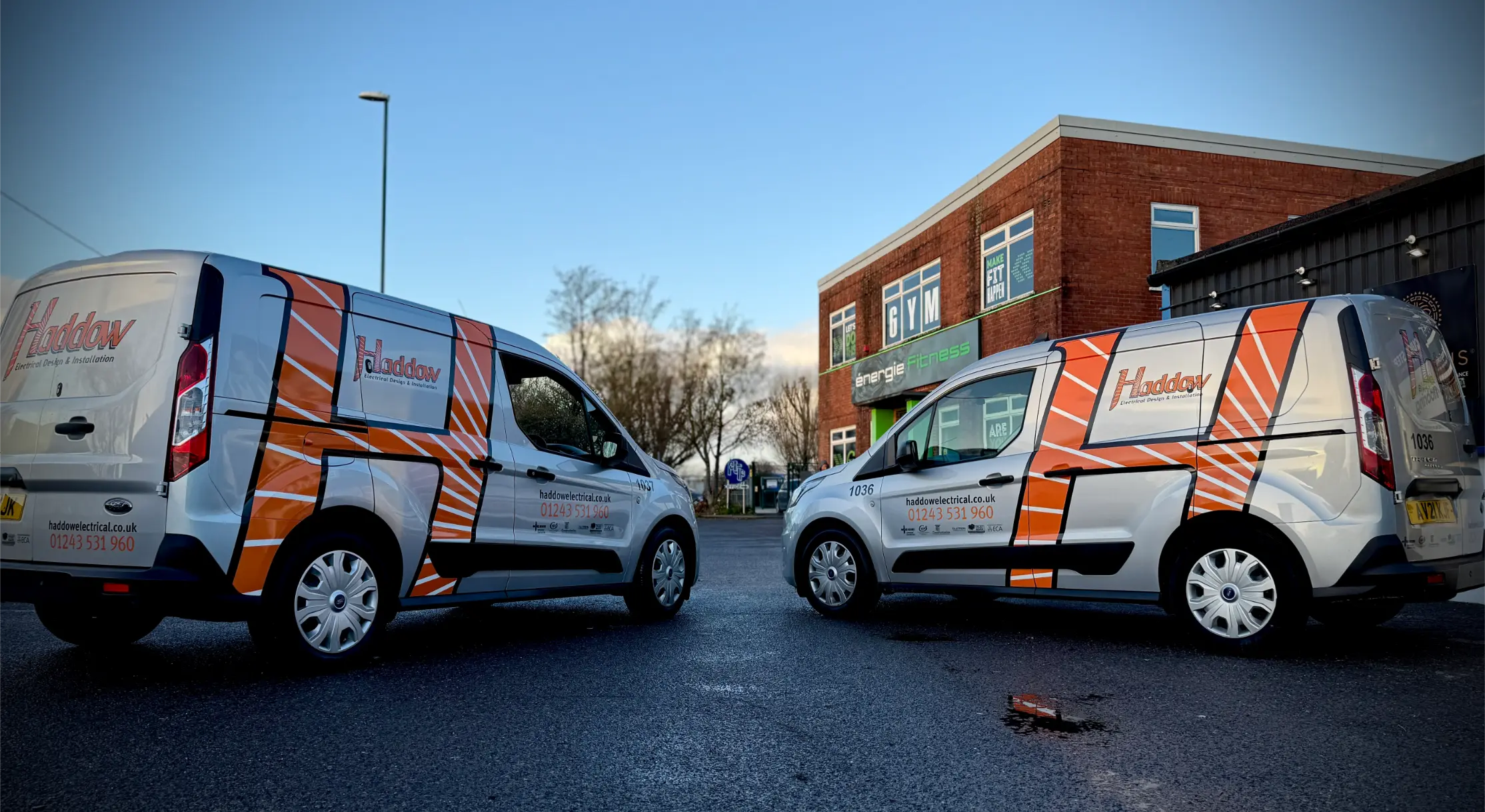 Two Haddow Group fleet vans with commercial vehicle graphics