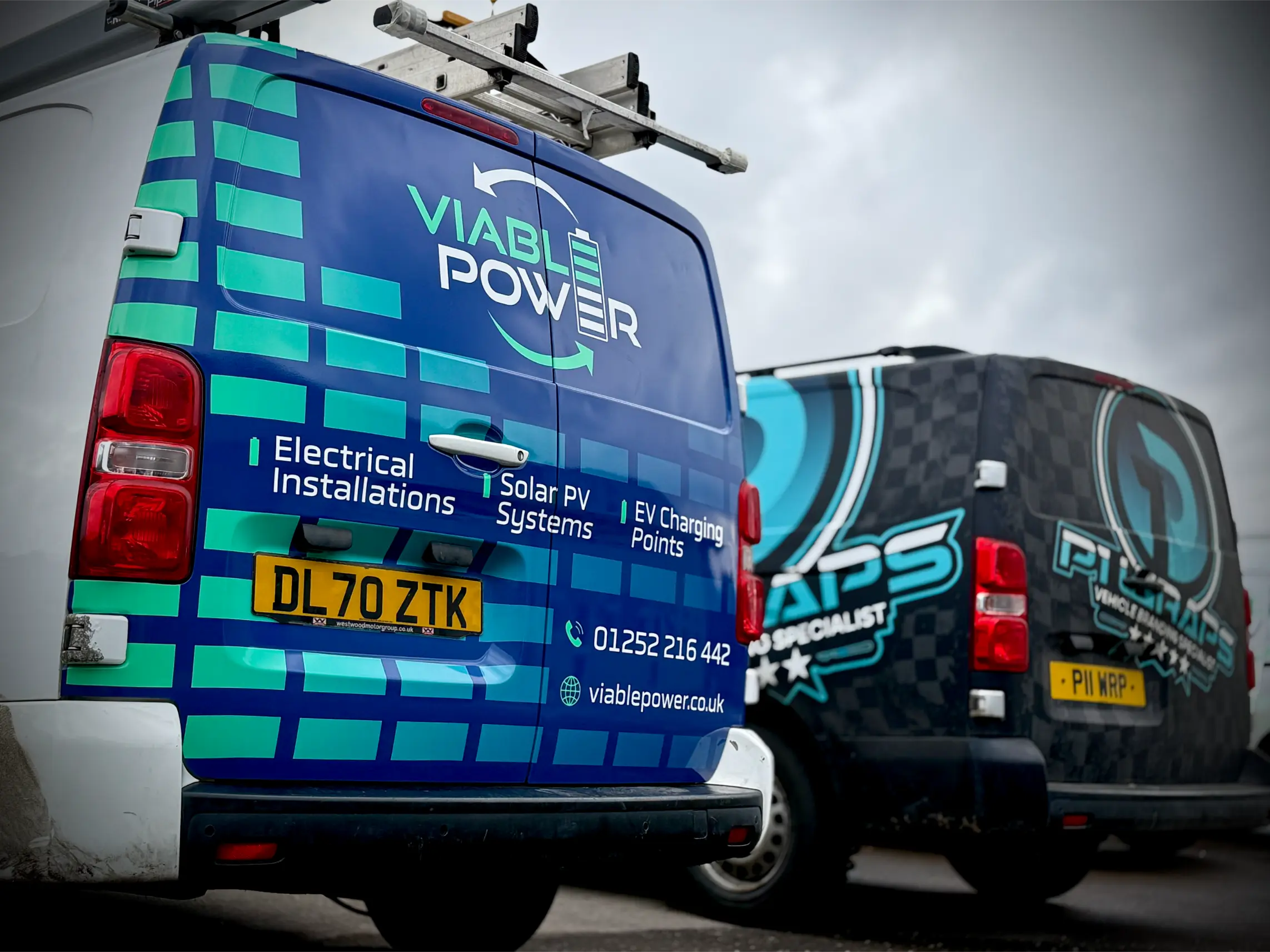 Viable Power service van with electrical and solar graphics