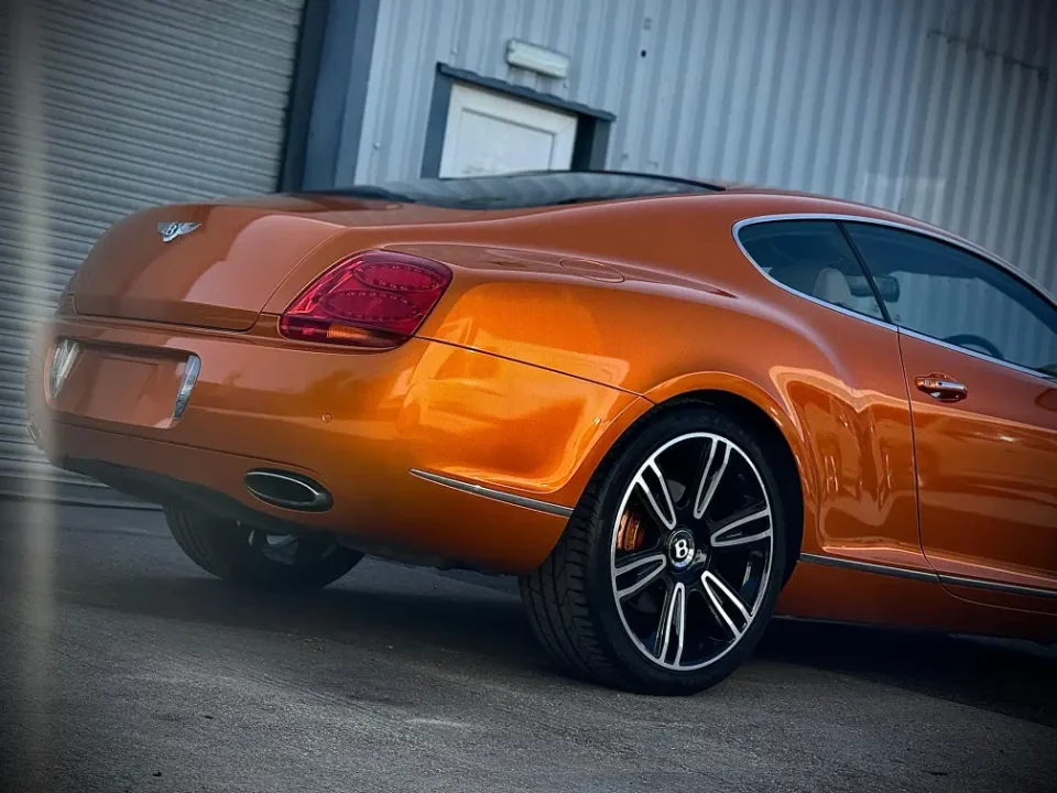 Orange colour change wrap bentley p1 wraps workshop
